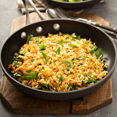 Fried rice is a hot dish that includes cooked rice, and depending on the recipe, eggs, meat, seafood, or vegetables.