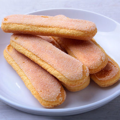 Ladyfingers are light, sweet, and spongy biscuits made from an egg base and shaped like fingers.