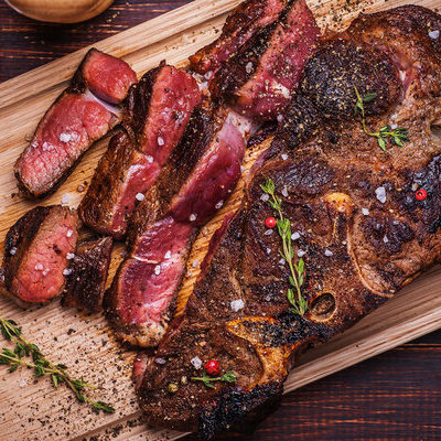 A steak is a piece of meat that includes animal muscle fibers and sometimes bone.
