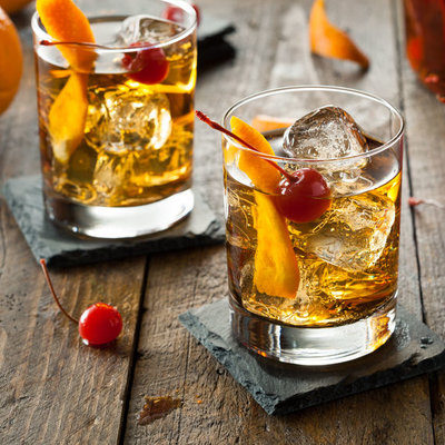 Whiskey is a distilled alcoholic drink made from fermented grain such as wheat, rye, corn, and barley, and aged in wooden barrels.