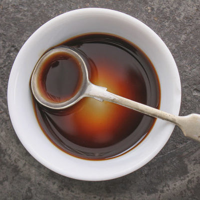 Worcestershire sauce is a sauce made of different ingredients, including vinegar, fermented onions, fermented garlic, molasses, tamarind paste, cured anchovies, salt, and sugar.