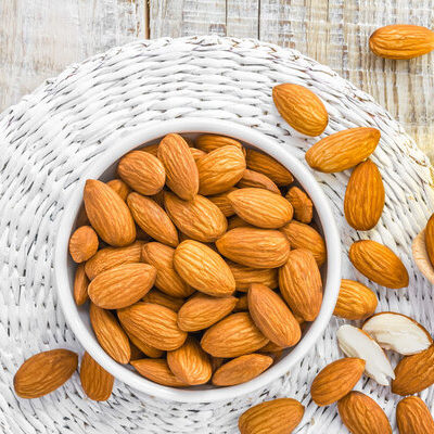 Almonds are the brown seeds of the fruit of the almond tree, which are considered drupes or stone fruits.