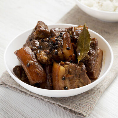 Humba is a Filipino pork-based dish that contains banana blossoms, salted black beans, pineapple juice, soy sauce, and brown sugar.