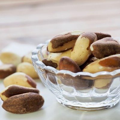 The Brazil nut (Bertholletia excelsa) is a brown, oval-shaped nut that belongs to the monkey pot tree (Lecythidaceae) family.