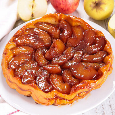 Tarte Tatin is a French fruit tart named after the Tatin sisters.