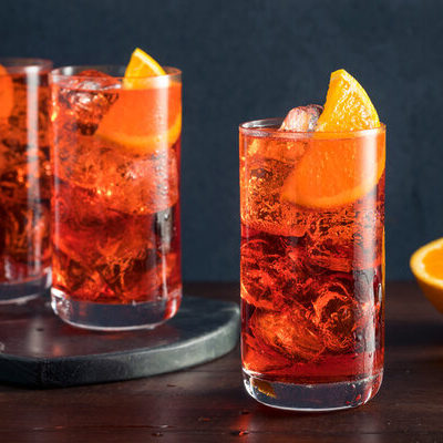 Americano is a cocktail of Italian origin made of Campari and sweet vermouth along with soda, garnished with a lemon slice.