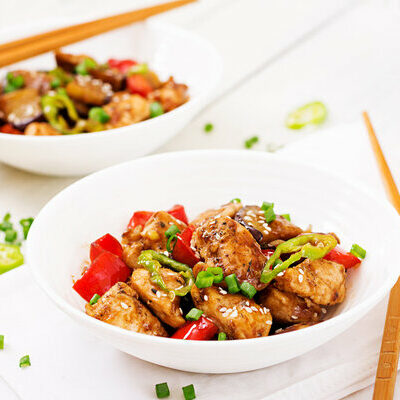 Kung Pao Chicken is a Chinese dish prepared with chicken, peanuts, vegetables, and chilies.