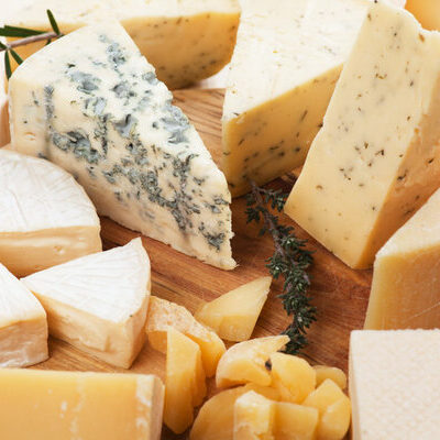 Cheese is a dairy product made from milk through the coagulation of the casein protein. It may be made using milk from various animals including cows, buffaloes, goats, sheep, camels, horses, and even yak.