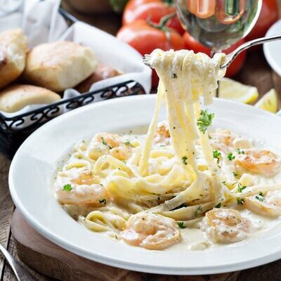 Alfredo sauce is a type of white sauce of Italian origin. It is a simple sauce made with butter and Parmesan cheese, and is often paired with fettucine pasta.