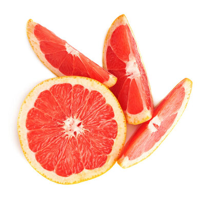 Grapefruit is a citrus fruit that has a soft flesh like an orange and a juicy interior, which is segmented.