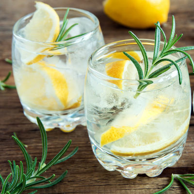 Gin is a distilled alcoholic drink that is flavored with juniper berries or other plant derivatives.