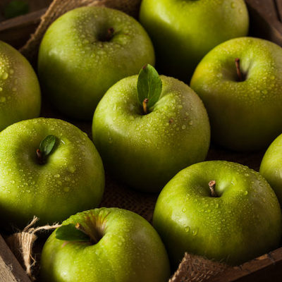 The green apple is a specific type of apple which is light green in color, with crisp and juicy flesh.