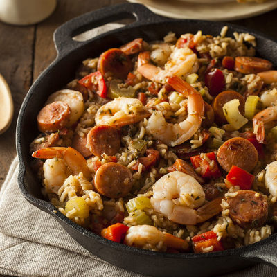 Jambalaya is a popular dish which primarily consists of vegetables and meat combined with rice.