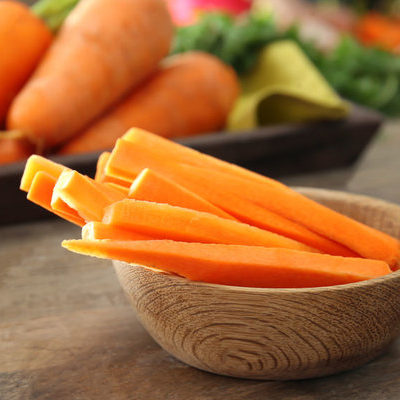 Carrots are a long root vegetable with a fuzzy, grassy top.