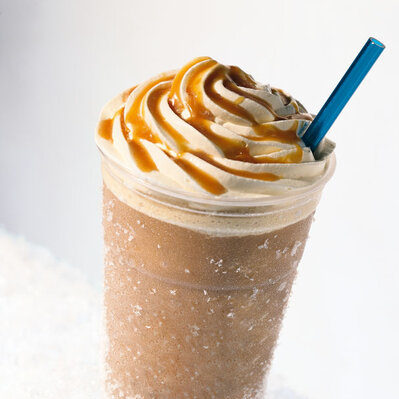 A frappé is a cold blended beverage with a name derived from the French verb frapper, which means “to hit” or “to strike”