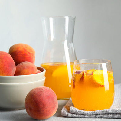 Peach juice is made by blending the soft and juicy peach fruit with water.