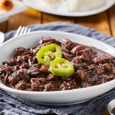 Dinuguan is a Filipino dish that is made with pork offal and pig’s blood in the form of a stew. The dish may include lungs, kidneys, intestines, ears, hearts, and the snouts of pigs.