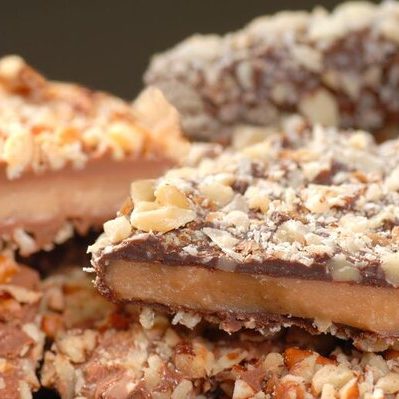 Toffee is a crunchy confection composed of caramelized sugar or molasses and butter.