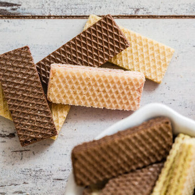 A wafer is a light, sweet, and crispy cookie often used as a garnish or as an ingredient that brings crunch to confections.