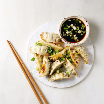 Dumplings are the umbrella term for a classification of foods made from dough wrapped around a filling or without a filling.