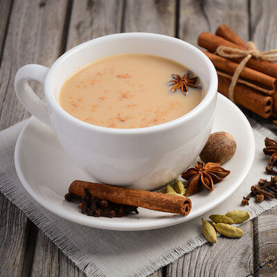 Chai is an Indian tea produced by boiling black tea in water and adding ingredients like milk, spices, and herbs.