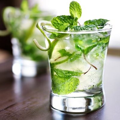 The mojito is an alcoholic beverage made with white rum, lime juice, sugar, and mint.
