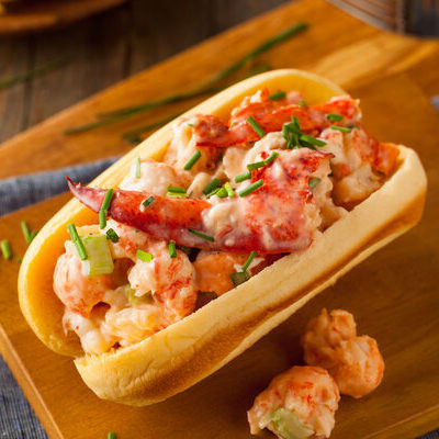 A lobster roll is a sandwich made of lobster meat rolled into a hot dog-style bun.