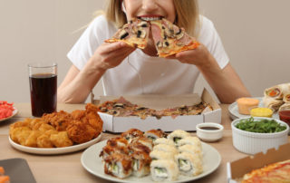 Food addiction is described as compulsive eating habits, which mimic addiction.