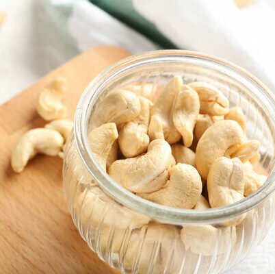 Cashew nut is a tree nut harvested from the cashew seeds that hang from the fruit of the cashew apple.