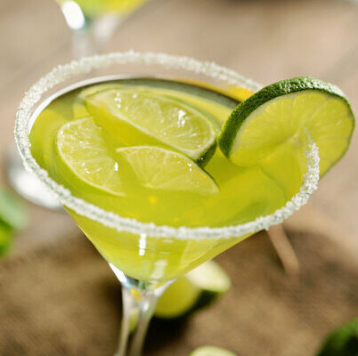 Margarita is a classic cocktail made with a tequila base and mixed with orange liqueur and lime juice.