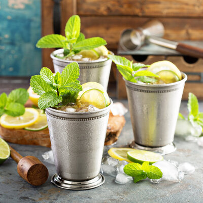 Mint Julep is a cocktail made with bourbon whiskey, sugar, water, crushed ice, and mint.