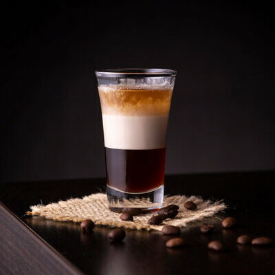 The B-52 is a layered cocktail consisting of coffee liqueur, Irish cream, and an orange liqueur.
