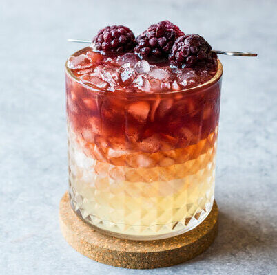 The Bramble is a cocktail of British origin, consisting of gin, lemon juice, sugar, and crème de mûre, which is a blackberry liqueur.