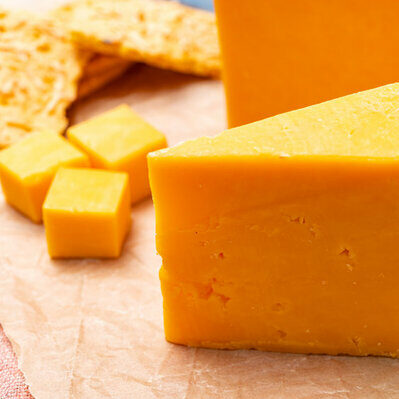 Cheddar is a type of cheese of English origin. Its name comes from a village in Somerset, England