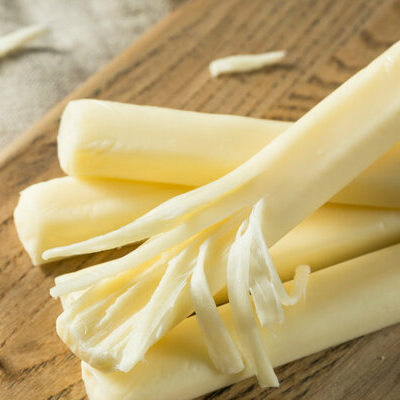 String cheese is a specific type of cheese that is in the form of strands and is processed by aligning the proteins in the cheese together.