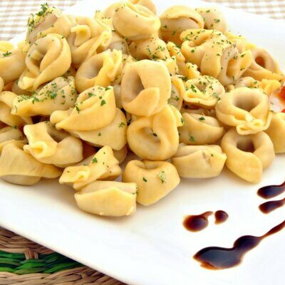 Tortellini is a pasta dish originating from the Italian region of Emilia-Romagna.