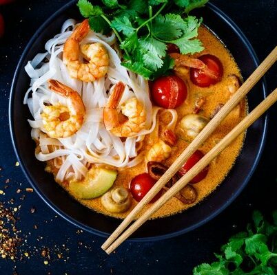 Tom yum is a Thai dish that is prepared in the form of a soup. The main meat in it is usually shrimp, though chicken and pork may also be used.